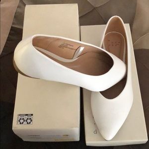 Flat white dress shoes